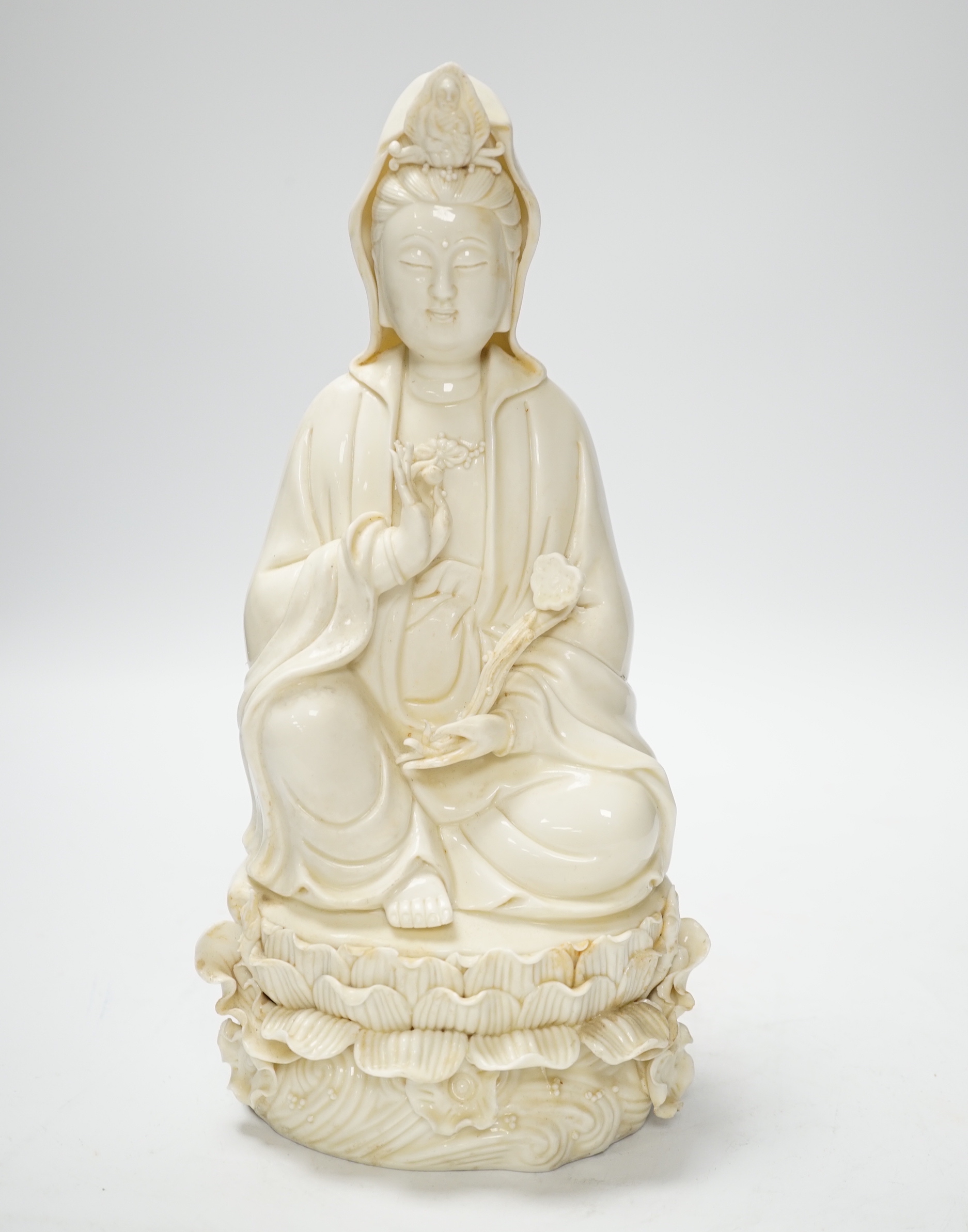 A Chinese blanc de chine figure of Guanyin, 26cm